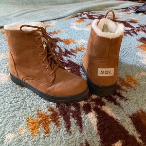 SQL fur lined boots.
